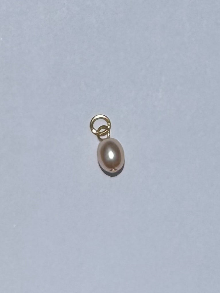 Light pink pearl charm